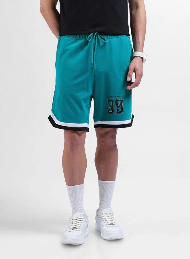 ذا انديان كراج كو Men Oversized Fit Batman Printed Side Pocket Mid-Rise Shorts